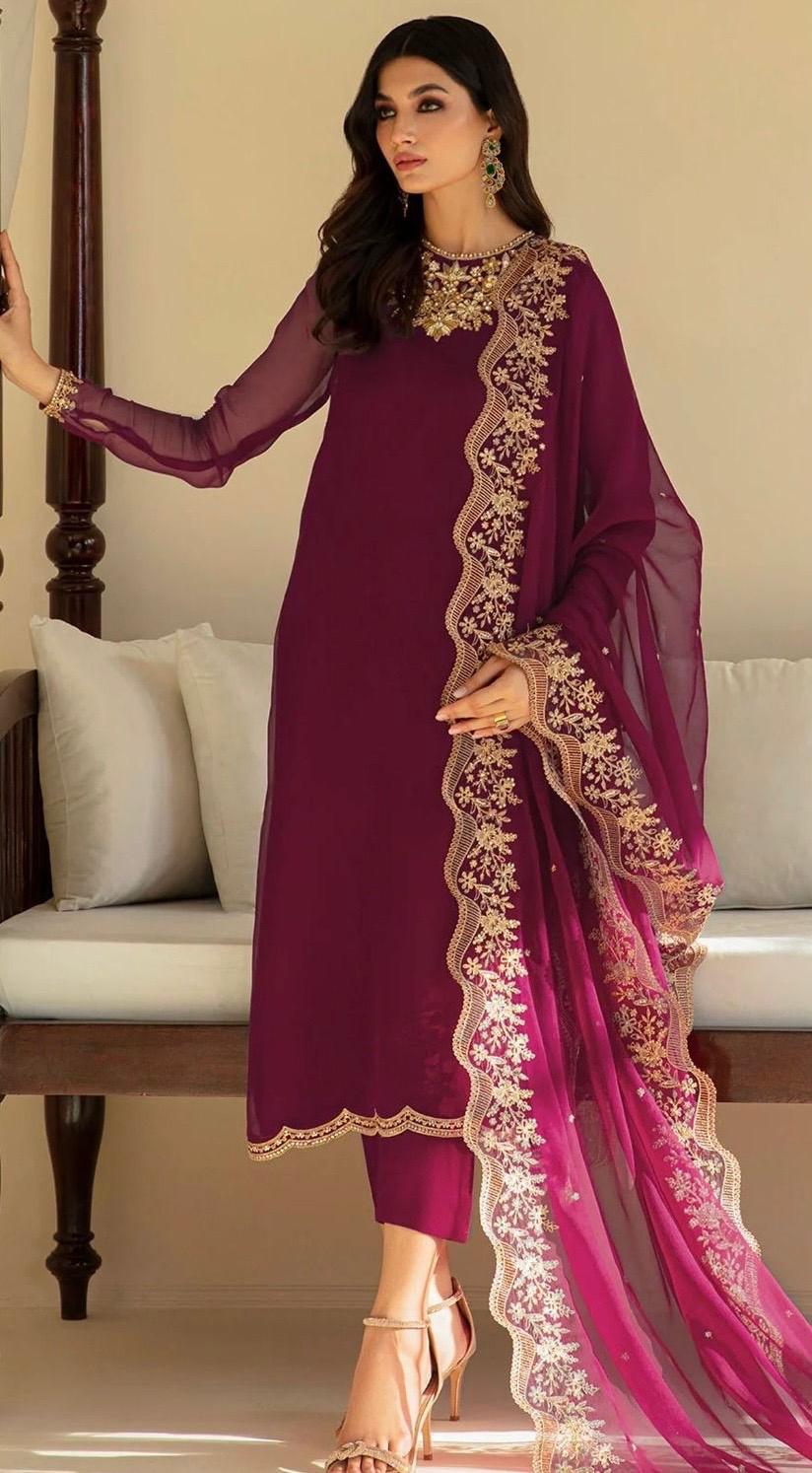 Magenta Colour Organza Suit with Embroidery on Neck andn Daman and Border on Dupatta